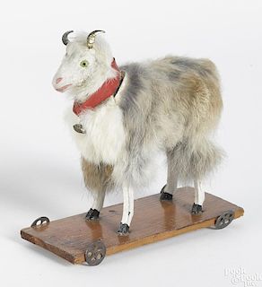 Stick leg goat platform pull toy