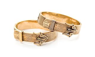 A Pair of Victorian Buckle Motif Bangle Bracelets, 26.00 dwts.