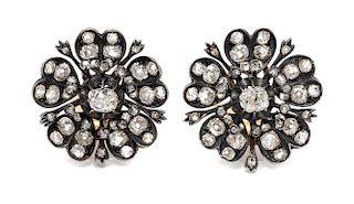 A Pair of Victorian Silver, Gold and Diamond Flower Earclips, 10.60 dwts.