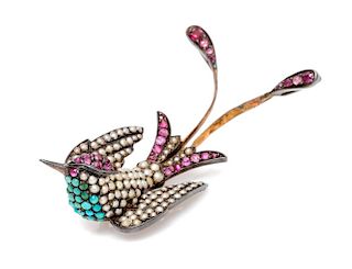 A Victorian Silver, Gold, Turquoise, Ruby and Seed Pearl Swallow Brooch,