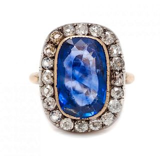 A Bicolor Gold, Sapphire and Diamond Ring, 4.80 dwts.
