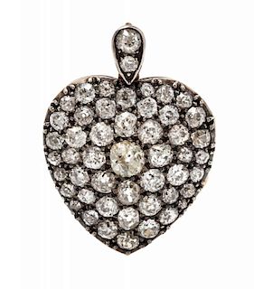 A Victorian Silver Topped Gold and Diamond Heart Locket Pendant, 5.70 dwts.