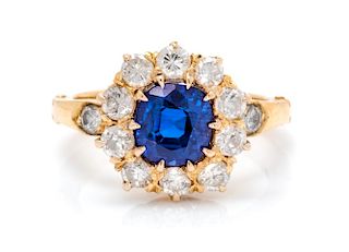 A Yellow Gold, Sapphire and Diamond Ring, 3.10 dwts.