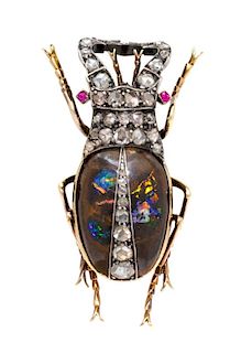A Victorian Silver Topped Gold, Diamond, Opal and Ruby Beetle Brooch, 10.50 dwts.