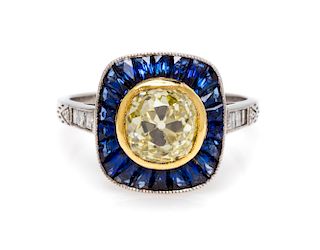 A Platinum, Colored Diamond, Diamond and Sapphire Ring, 3.50 dwts.