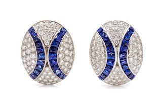 A Pair of Platinum, Sapphire and Diamond Earclips, 14.40 dwts.