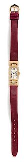 An 18 Karat Yellow Gold and Diamond Wristwatch, Cartier, 12.00 dwts.