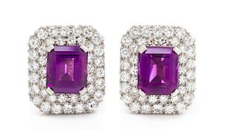 A Pair of White Gold, Amethyst and Diamond Earclips, 9.30 dwts.