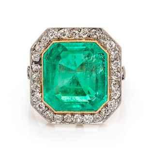 A Platinum Topped Gold, Emerald and Diamond Ring, 5.10 dwts.