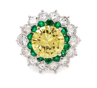 A Platinum, Fancy Intense Yellow Diamond, Diamond and Emerald Ring, 4.90 dwts.