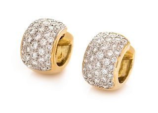 A Pair of 18 Karat Yellow Gold and Diamond Huggie Earclips, 7.40 dwts.