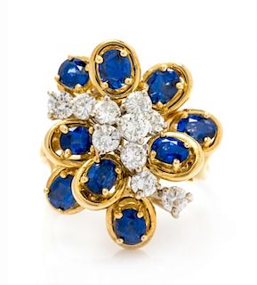 An 18 Karat Bicolor Gold, Sapphire and Diamond Ring, 8.80 dwts.