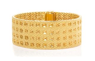 An 18 Karat Yellow Gold Bracelet, Cartier, France, Circa 1970, 70.60 dwts.
