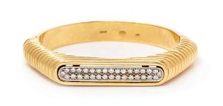 An 18 Karat Yellow Gold and Diamond Cuff Bracelet, 33.30 dwts.