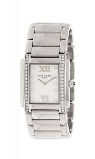 A Stainless Steel and Diamond Ref. 4910/010 "Twenty-4" Wristwatch, Patek Philippe,