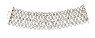 An 18 Karat White Gold and Diamond Openwork Link Bracelet, Spritzer & Fuhrmann, 76.60 dwts.