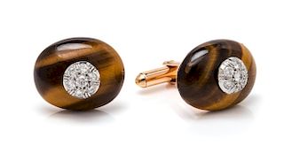 A Pair of Bicolor Gold, Tiger's Eye and Diamond Cufflinks, 8.40 dwts.