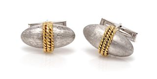 A Pair of Platinum and Yellow Gold Cufflinks, 13.10 dwts.