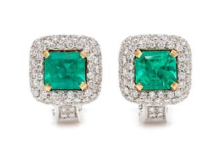 A Pair of 18 Karat Bicolor Gold, Emerald and Diamond Earclips, 11.30 dwts.