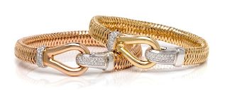 A Collection of 18 Karat Gold and Diamond "Primavera" Bangle Bracelets, Roberto Coin, 27.20 dwts.
