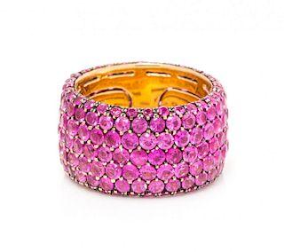 An 18 Karat Yellow Gold and Pink Sapphire Eternity Band, 9.40 dwts.