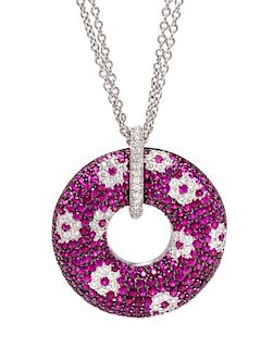 An 18 Karat White Gold, Diamond and Ruby Pendant Necklace, Roberto Coin, 17.20 dwts.
