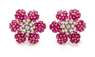 A Pair of 18 Karat Bicolor Gold, Ruby and Diamond Earclips, 14.70 dwts.