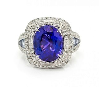 A Platinum, Tanzanite, Sapphire and Diamond Ring, 11.70 dwts.