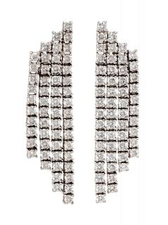 A Pair of White Gold and Diamond Fringe Earclips, 9.00 dwts.
