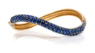 An 18 Karat Yellow Gold, Sterling Silver and Sapphire "S" Bangle Bracelet, Gioia, 18.30 dwts.