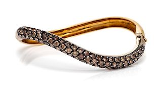 An 18 Karat Yellow Gold and Colored Diamond "S" Bangle Bracelet, Gioia, 19.20 dwts.