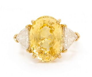An 18 Karat Yellow Gold, Yellow Sapphire and Diamond Ring, 6.40 dwts.
