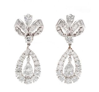 A Pair of Platinum and Diamond Pendant Earrings, 26.70 dwts.