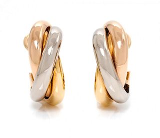 A Pair of 18 Karat Tricolor Gold "Trinity" Earclips, Cartier, 6.00 dwts.
