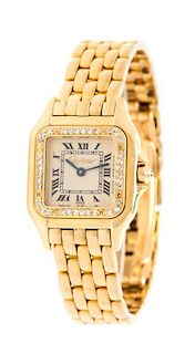An 18 Karat Yellow Gold and Diamond "Santos" Wristwatch, Cartier, 44.80 dwts.