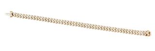 An 18 Karat Yellow Gold and Diamond Line Bracelet, 12.90 dwts.