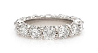 A Platinum and Diamond Eternity Ring, 5.80 dwts.