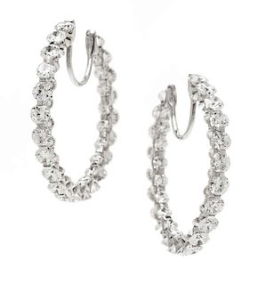 A Pair of 18 Karat White Gold and Diamond Inside-Out Hoop Earrings, Chopard,