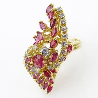 Vintage Marquise and Round Brilliant Cut Ruby, Round Brilliant Cut Diamond and 14 Karat Yellow Gold Cluster Ring.