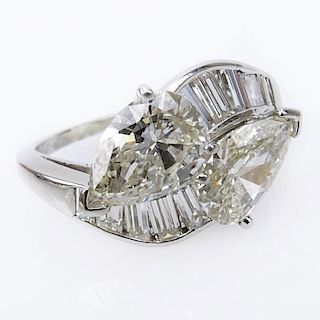 Approx. 3.69 carat TW Diamond and Platinum Bypass Ring.