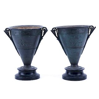 Pair of Late 19th Century Continental Neoclassical style White Metal Urns on Stepped Wood Bases.