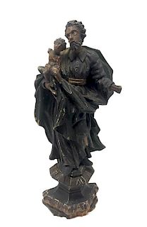 A Renaissance Carved Wooden Figurine of a Man with a Child