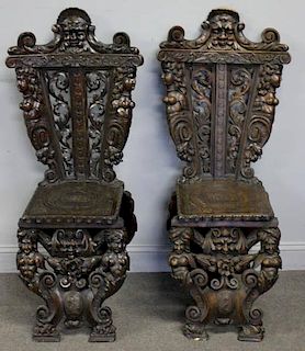 Pair of Heavily Carved Figural Ball Chairs.