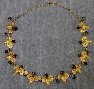 JEWELRY. 14kt Gold Rams Head and Garnet Necklace.
