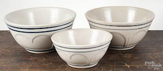 Three blue and white stoneware mixing bowls, 19th c., 5 3/2'' h., 12'' dia., 5 3/4'' x 12''and 4 1/4'' h.