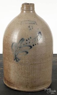 New York two-gallon stoneware jug, 19th c., with cobalt floral decoration, 14'' l.