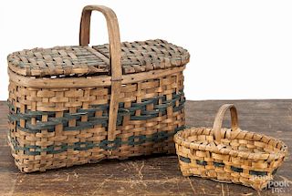 Two painted split oak baskets, ca. 1900, 9'' h. and 3 3/4'' h.