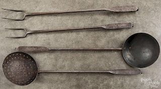 Four Pennsylvania wrought iron utensils, 19th c., stamped C.A. Reiley, to include two flesh forks,