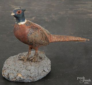 Carved and painted pine pheasant, mid 20th c., signed D & M Nichols, 6'' h., 9'' l.