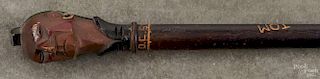 Carved and painted lodge or fraternal walking stick, inscribed O. C. Stuart `51, Tom, with a Nativ
